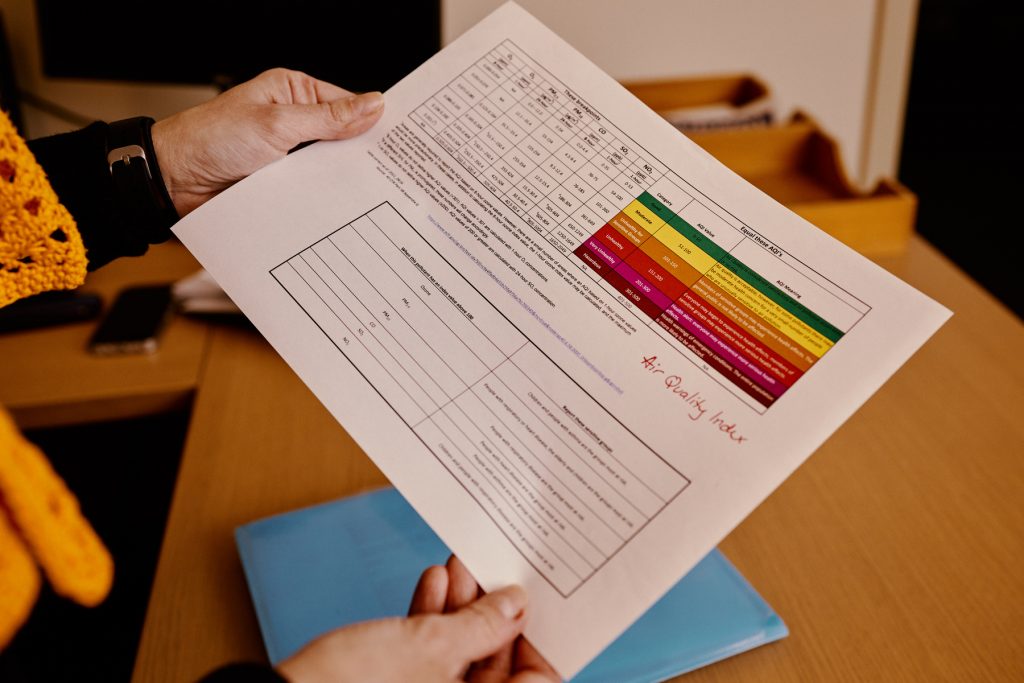 Close-up of a sheet of paper showing a data table and other information.